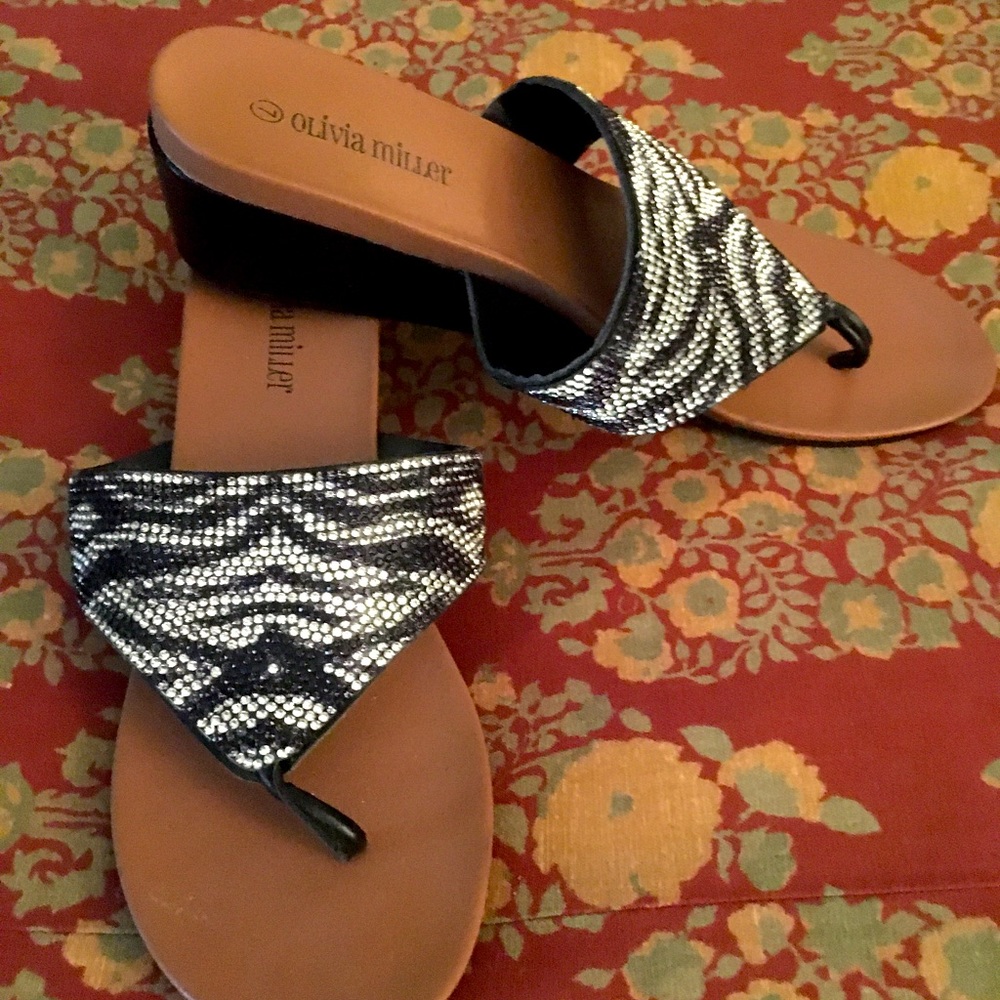 If you like shiny & sparkly; they are for you! Sandals size 7, like brand new